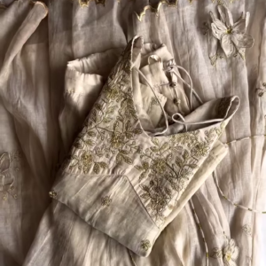 Elegant Ivory Hand-Embroidered Organza Lehenga Set