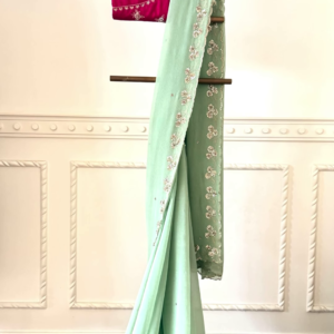Sea Green Embellished Saree with Fuchsia Embroidered Blouse