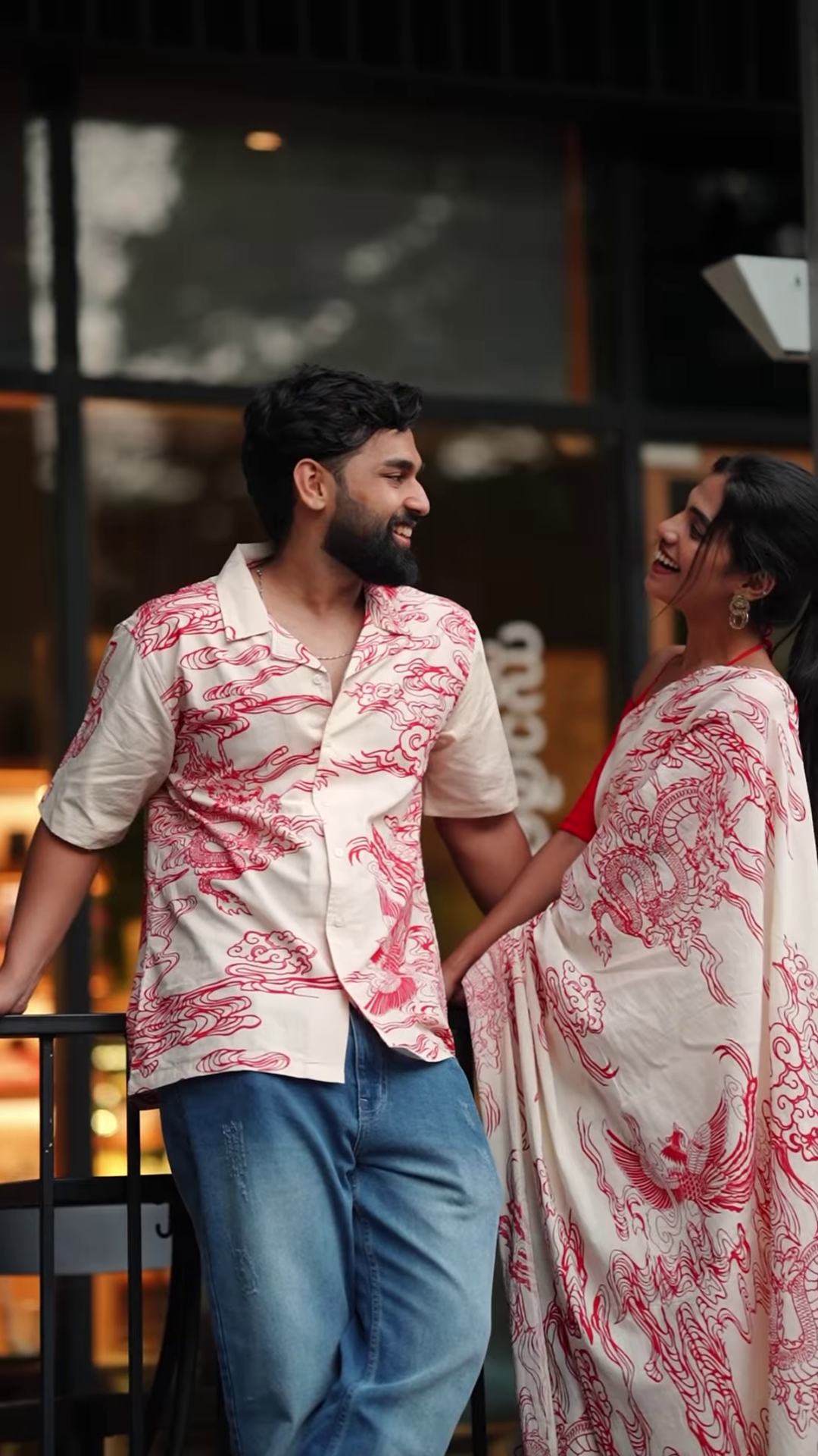 Couple’s Coordinated Ethnic Ensemble – White & Red Printed Saree with Matching Shirt and Jeans - Image 5