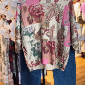 Women’s Patchwork Floral Print Sweater with Blue High-Waisted Jeans – Casual Boutique-Inspired Ensemble