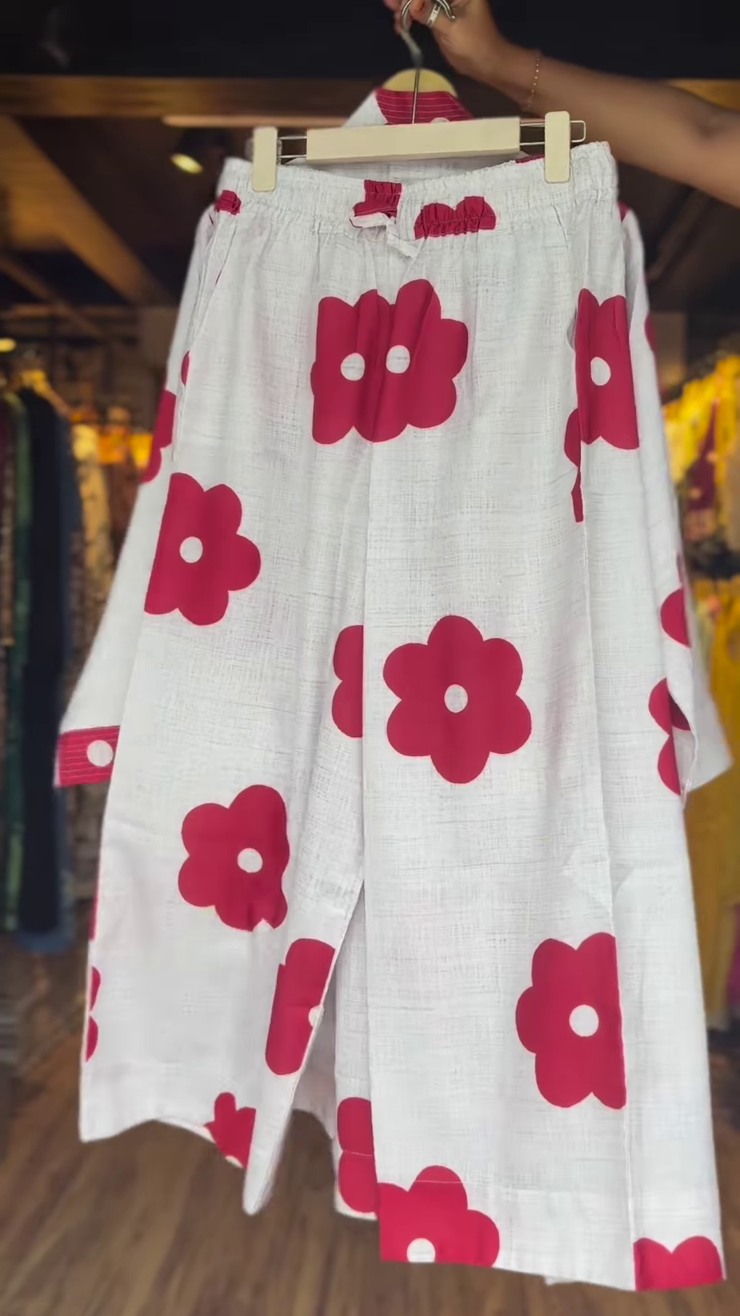 Women’s White Asymmetrical Top with Bold Red Floral Prints – Elegant High-Low Casualwear - Image 2