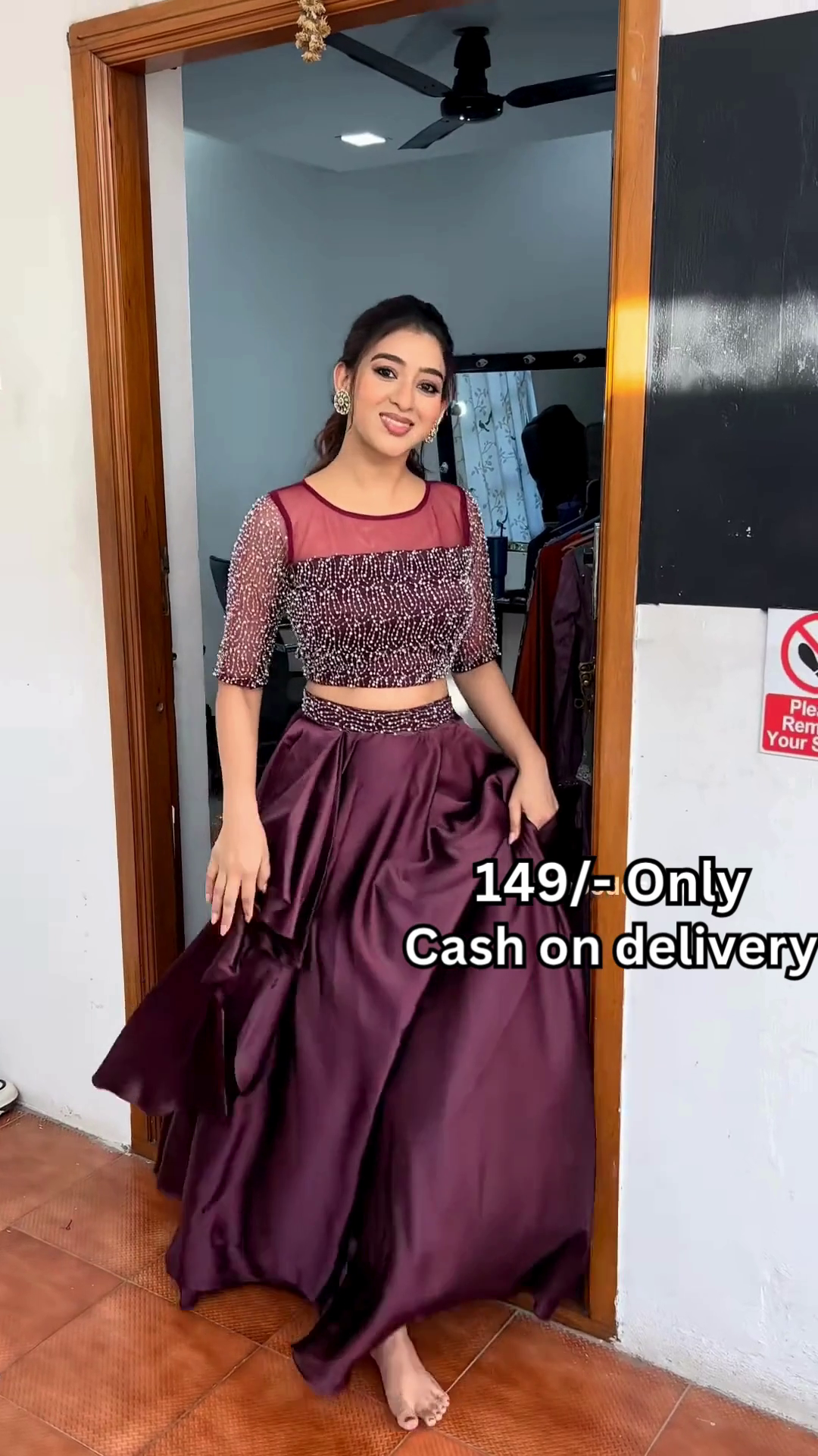 Women’s Red Embroidered Skirt Top Set with Traditional Earrings – Ethnic Doorway Portrait Ensemble - Image 2