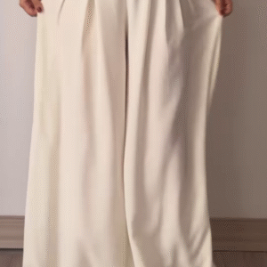 Women’s Beige Wide-Leg Pleated Pants with Drawstring Waist – Flowing Casualwear Styled with White Sneakers
