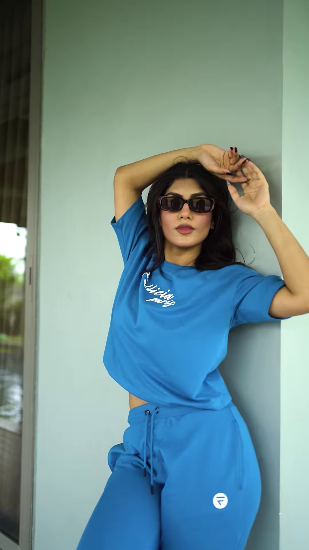 Unisex Bright Pink Tracksuit with Drawstring Joggers & Printed Sweatshirt – Casual Athleisure Set Styled with White Sneakers - Image 2